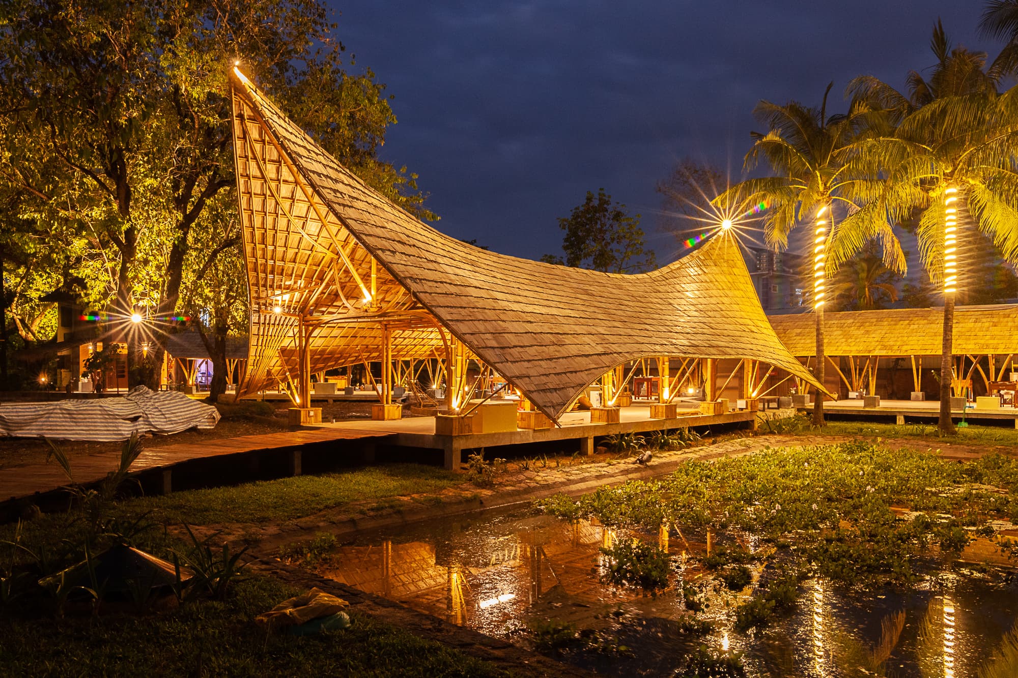 Bamboo architecture inspired by Khmer ornaments.